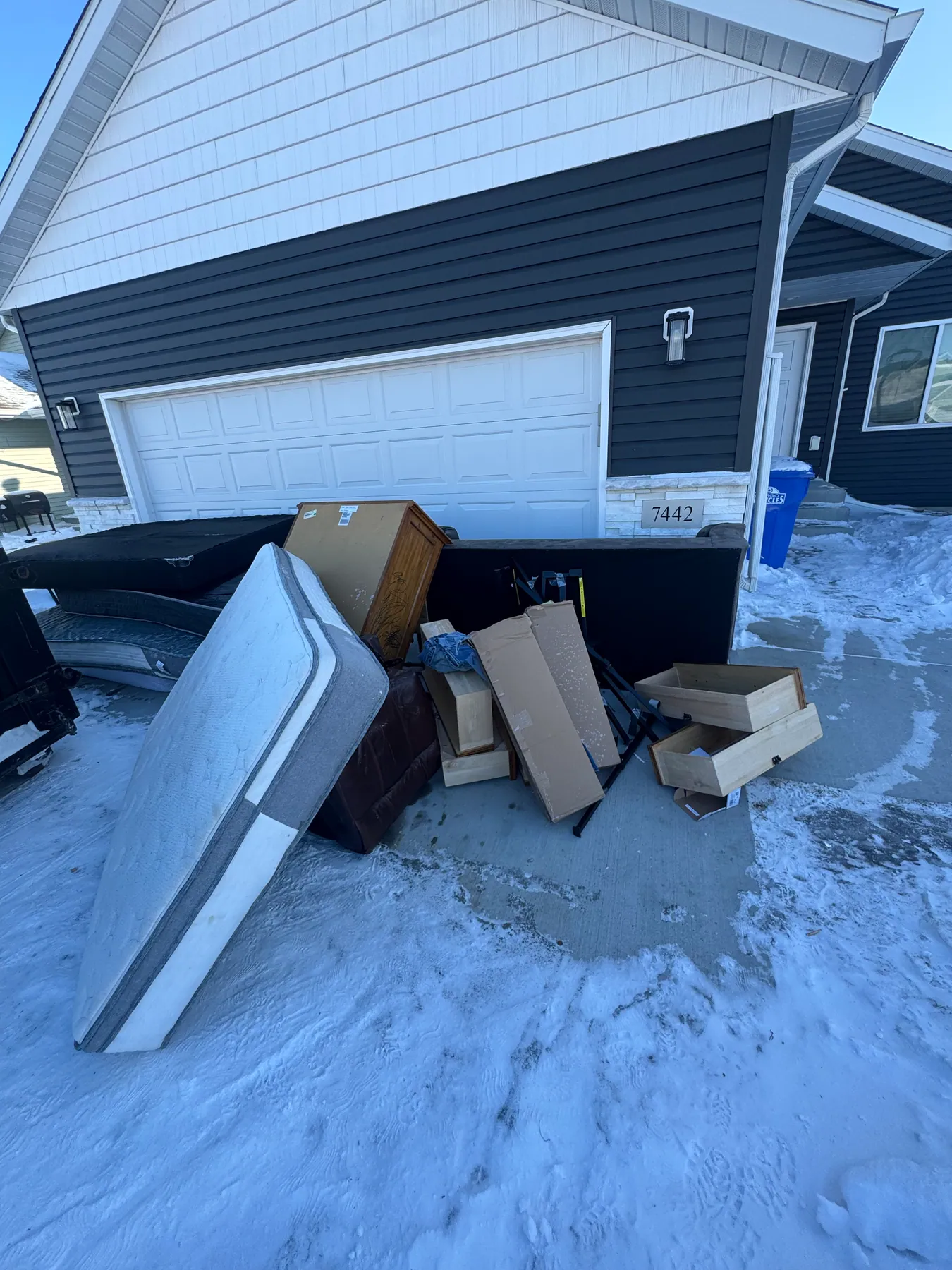 Driveway furniture pickup — before