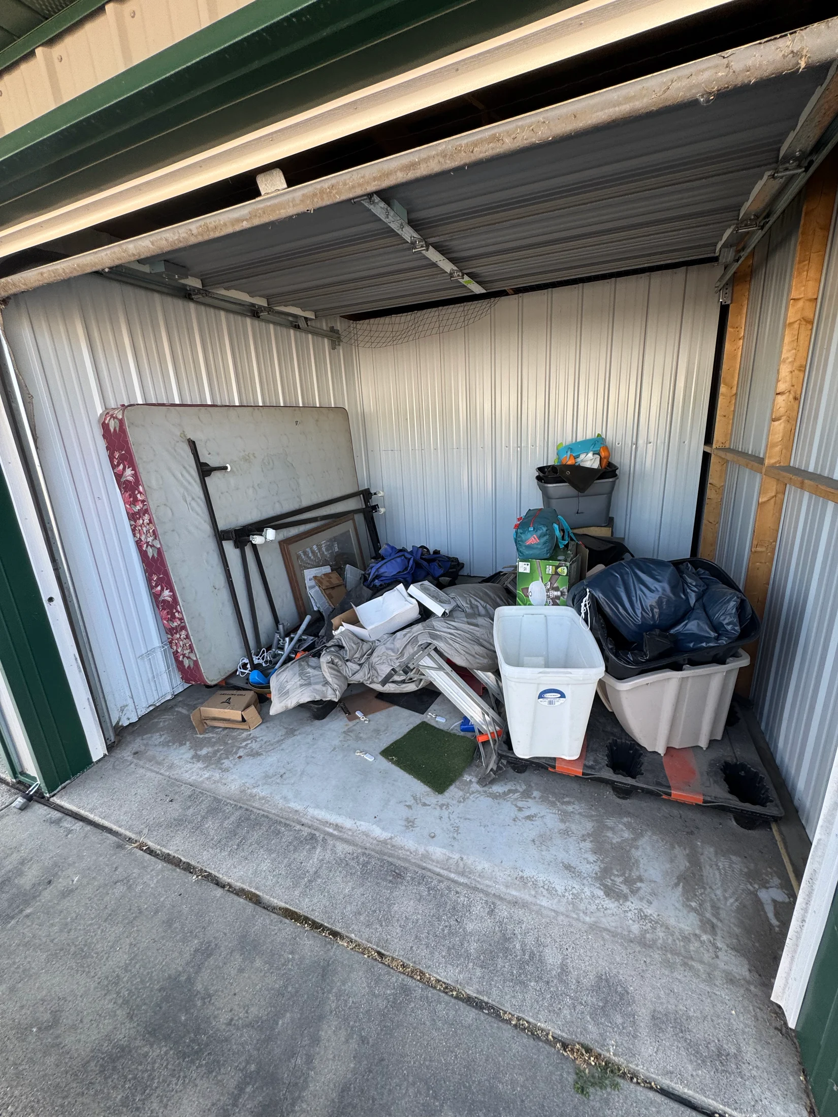 Storage unit cleanout — before